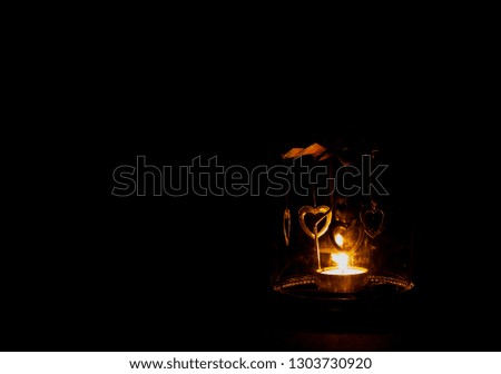 Low key picture of heart shape candle holder