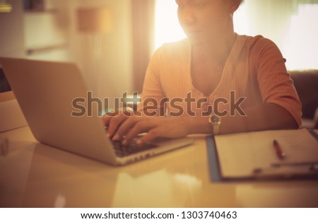 Worthy hands. African American woman working at home.