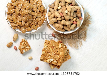 peanut chikki, sesame candy and roasted groundnuts - Image