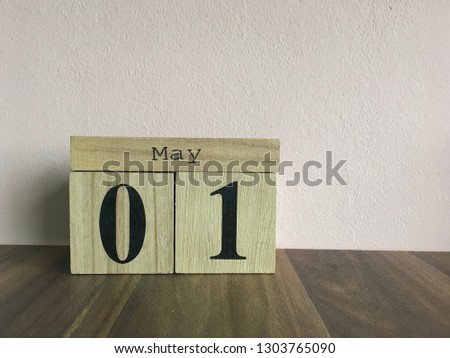 May 1st. Image of may 1 wooden calendar. International Worker’s Day.