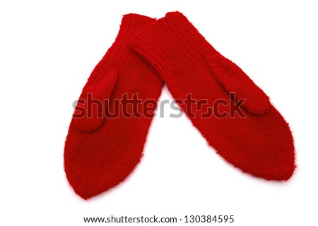 Old fashion red knitted mittens isolated on white
