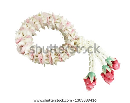 Traditional Thai garlands made by white and pink orchid and rose petals with isolated background