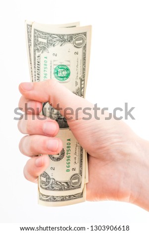 One US Dollar banknotes in man hand.