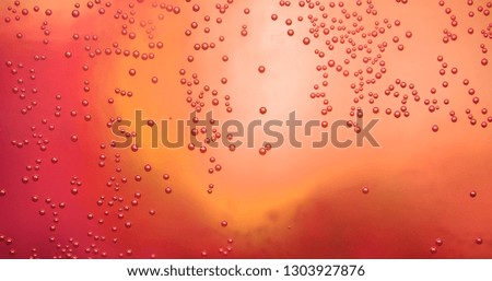 the background image is bright bubbles on the glass