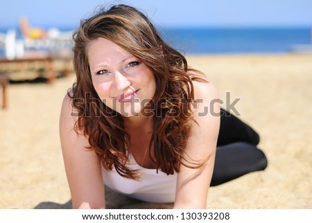 beautiful pregnant with a girl by the sea