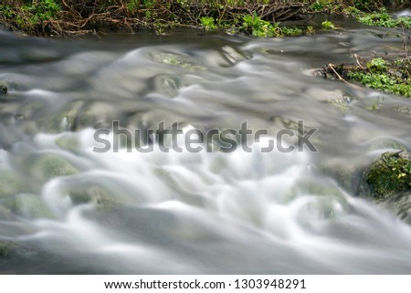 Long exposure of the water of a small river in central Italy