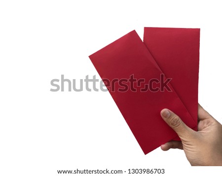 Woman hand holding red envelope (Ang Pao), white background, Chinese New Year concept