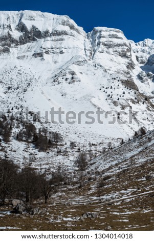 Snowy alpine mountains.