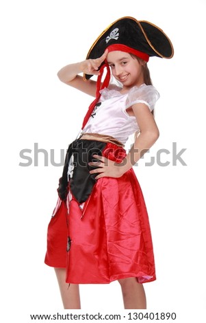 Young girl dressed as a pirate in a red skirt and a black hat with a skull on white background