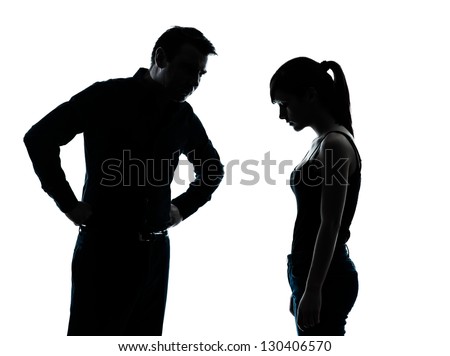 one man and teenager girl dispute conflict  in silhouette indoors isolated on white background