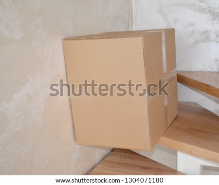 Cardboard box on the stair