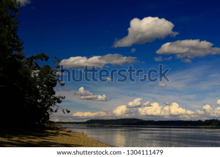 a picture of an exterior Pacific Northwest Puget sound shoreline