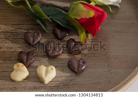 Excellent valentines breakfast of orange juice, heart chocolates and roses