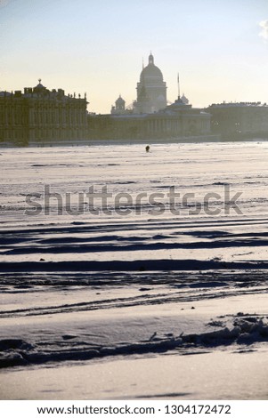 The Neva river panorama in Saint-Petersburg, Russia. Color winter photo of the frozen river.