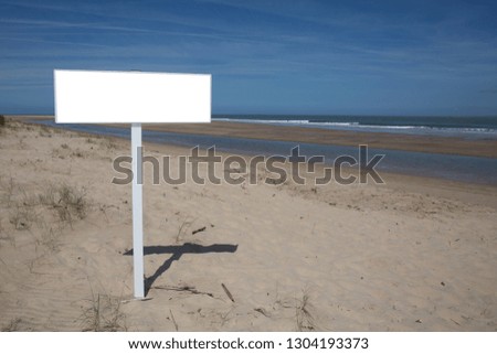blank empty frame on sand beach for message advertising