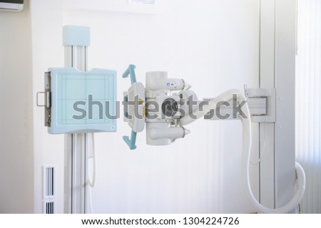 close up pgoto of a X-ray machine and radiology room equipment 