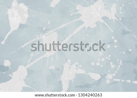 Luxury blue gold and white silver metal paint splatter effect on watercolor paper background. Gray glitter splash texture. Beautiful feminine backdrop.