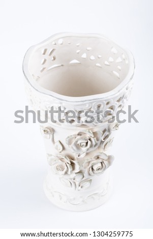 an empty vase on a white background