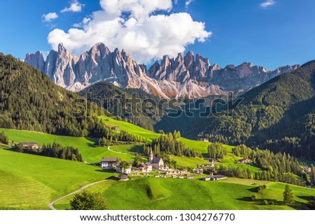 Famous alpine place of the world, Santa Maddalena village with magical Dolomites mountains in background, Val di Funes valley, Trentino Alto Adige region, Italy, Europe Royalty-Free Stock Photo #1304276770