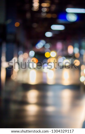 Abstract photo blurred of colorful Light at parking area.