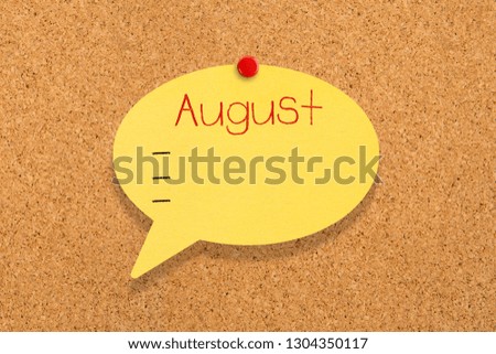 Sticky note pinned on bulletin board, August