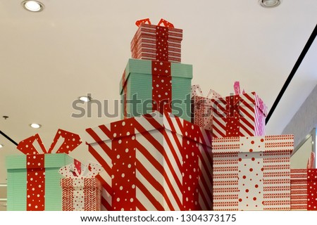 Gift wrapped boxes stacked together 