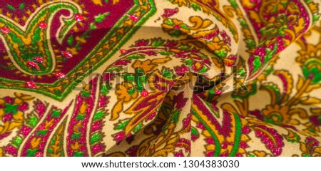Background texture, pattern, paisley fabric cotton.  Designed by Kaffe Fassett for Free Spirit, the color palette of this large paisley is shades of green with hot pink, cobalt blue fuchsia and purple
