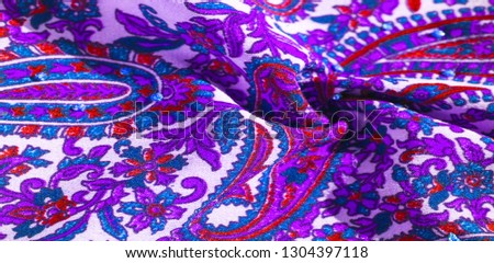 Background texture, pattern, paisley fabric cotton.  Designed by Kaffe Fassett for Free Spirit, the color palette of this large paisley is shades of green with hot pink, cobalt blue fuchsia and purple