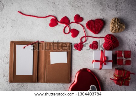 Top view Blank white card on wallet and heart gift