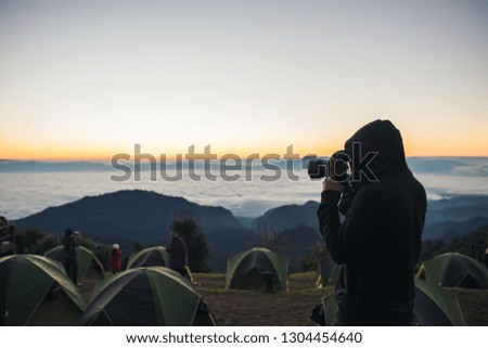 Morning Photographer Camping in the mountain background