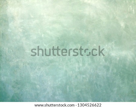 green cement wall background with free space for text.