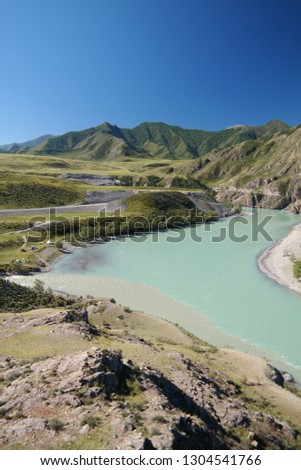 Wonderful beauty of the nature of the Altai Mountains and the turquoise mountain river Katun.