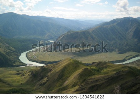 Wonderful beauty of the nature of the Altai Mountains and the turquoise mountain river Katun.