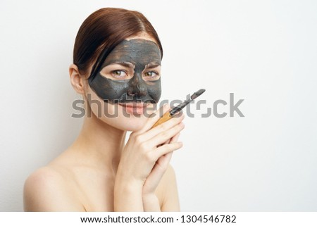 woman in a cosmetic mask