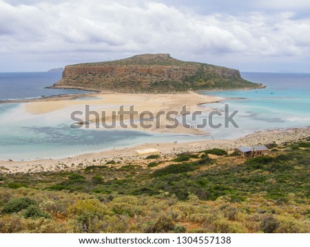 Amazing Balos blue Lagoon with Cape Tigani in the center in Crete island, Greece. Viewpoint from the Balo's beach trail at the western part of Kissamos Bay. Royalty-Free Stock Photo #1304557138