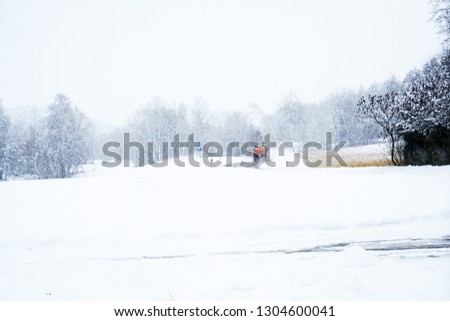 Landscape pictures with a lot of snow in cloudy weather in Germany Bavaria included              