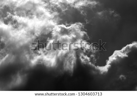 black sky and white cloud