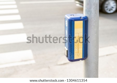 Traffic light control button with crosswalk scheme for blind people. Pedestrian road crossing for vision disabled people . Care, support and assistance for handicapped people