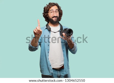 young fool man with a photo camera