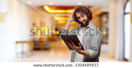 young fool man with a tablet