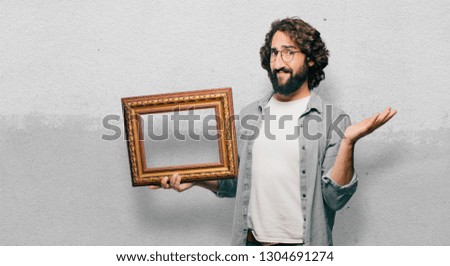 young fool man with a baroque frame
