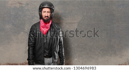 motorbike rider crying sad