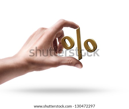 Man's hand holding golden percent symbol isolated on white background