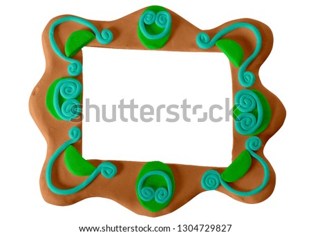 Colorful Play dough (Plasticine or Clay). Picture Frame. Created by hands. Isolated on white background.- Image