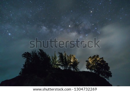 Milkyway in the night sky over a hill at Tip Of Borneo Sabah, Malaysia. 