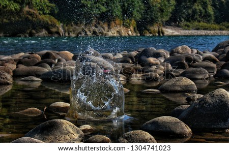 picture of water splashing in the Nameri picnic spot of Assam, India.