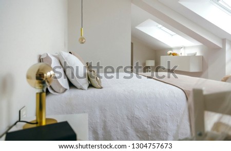 Sober and elegant bedroom with queen size bed