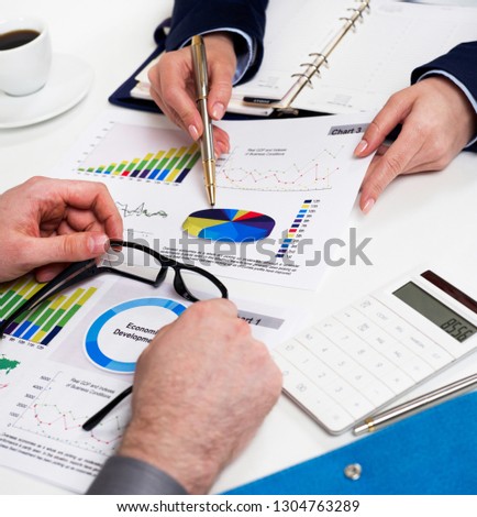 Business people working on financial data