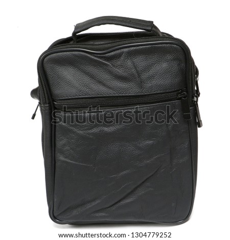 Modern black leather men casual or business messenger case isolated on white background. Shooted in professioanl photo studio for bloggers and advertising agencys.