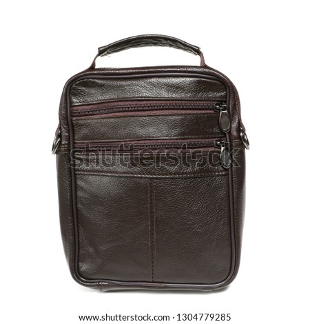 Modern black leather men casual or business messenger case isolated on white background. Shooted in professioanl photo studio for bloggers and advertising agencys.